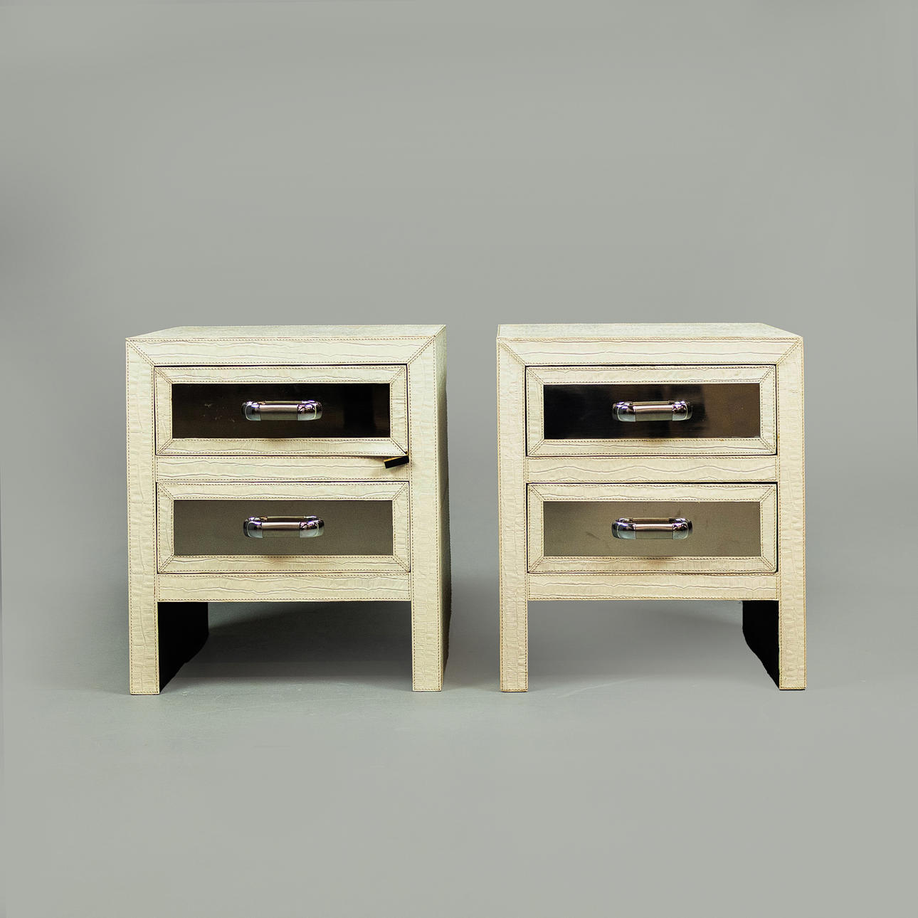 FAUX CROCODILE UPHOLSTERED SIDE CHESTS, A PAIR.