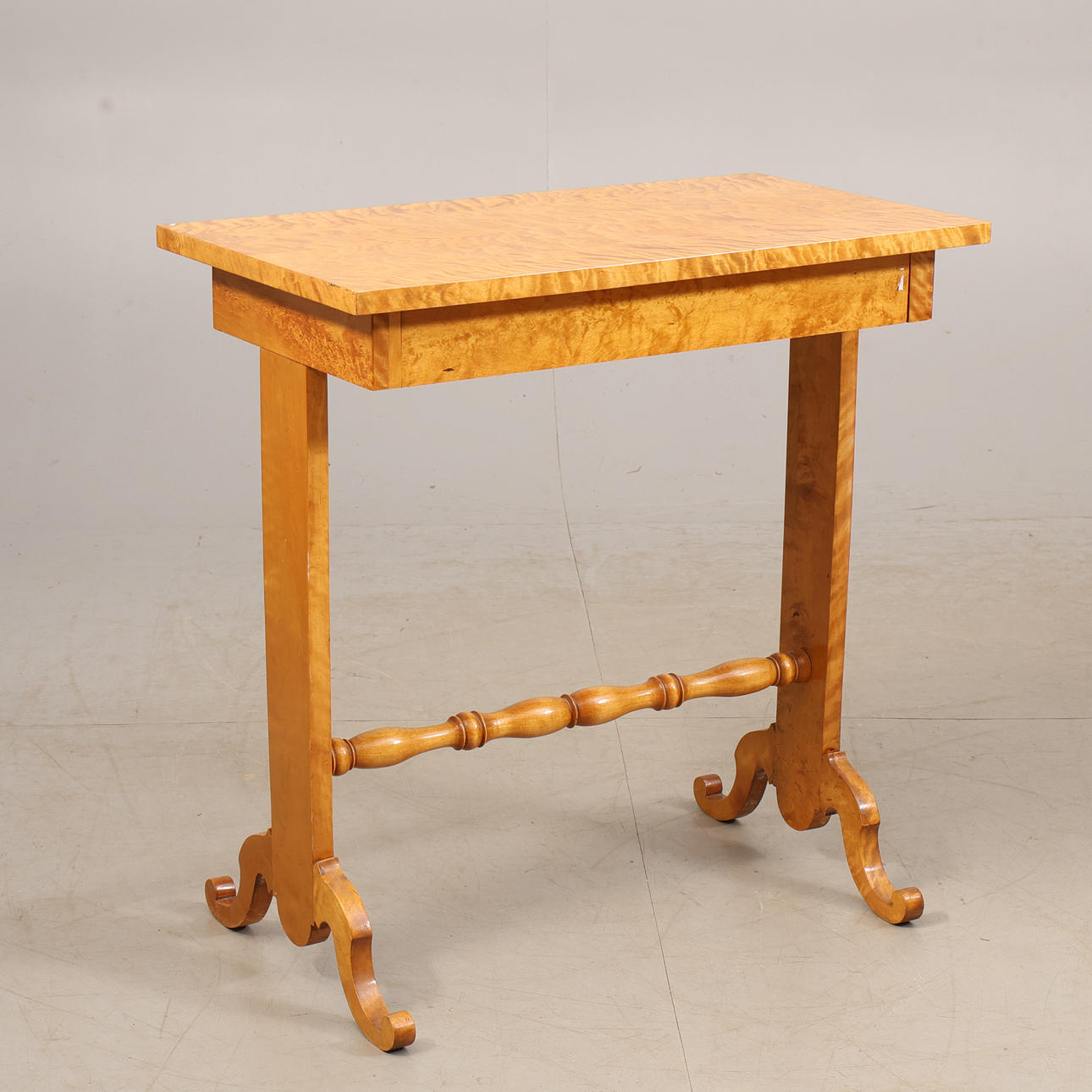 A late Empire sewing table, 19th century.