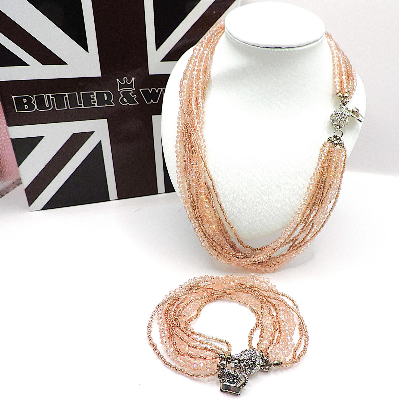 SIGNED BUTLER & WILSON NECKLACE & BRACELET SET.