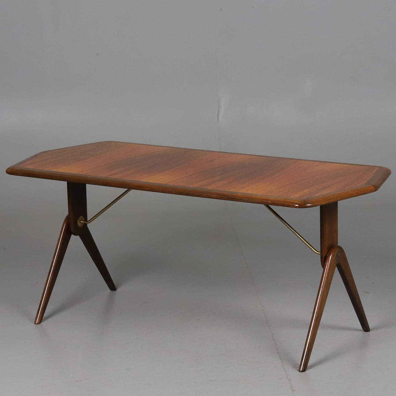 COFFEE TABLE. Oak and brass. 6 angular table top, 1960s.