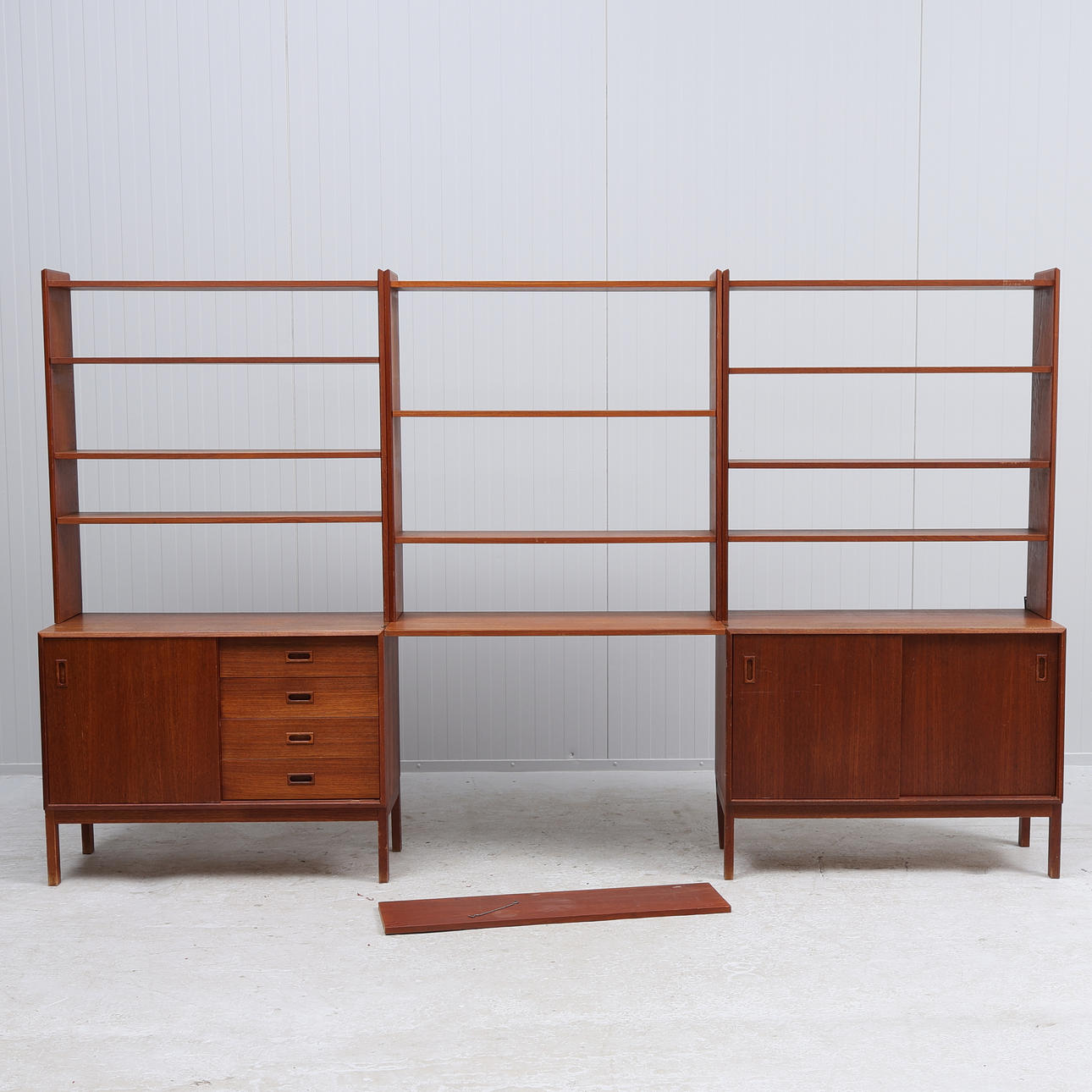 A three-section teak bookcase, Sweden, mid 20th century.