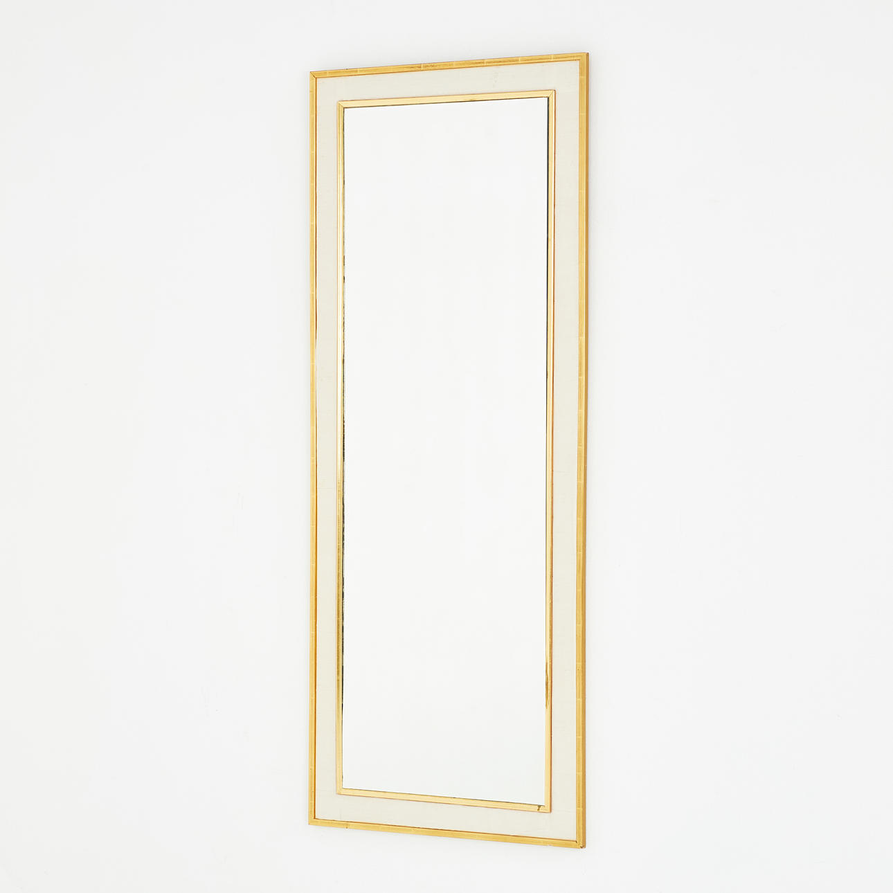 MIRROR, white textile frame with gilded moldings, attributed to NK.