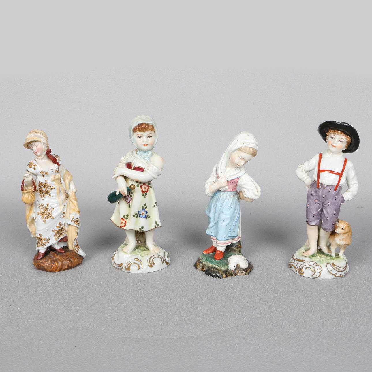 FOUR CONTINENTAL PORCELAIN FIGURES (4).