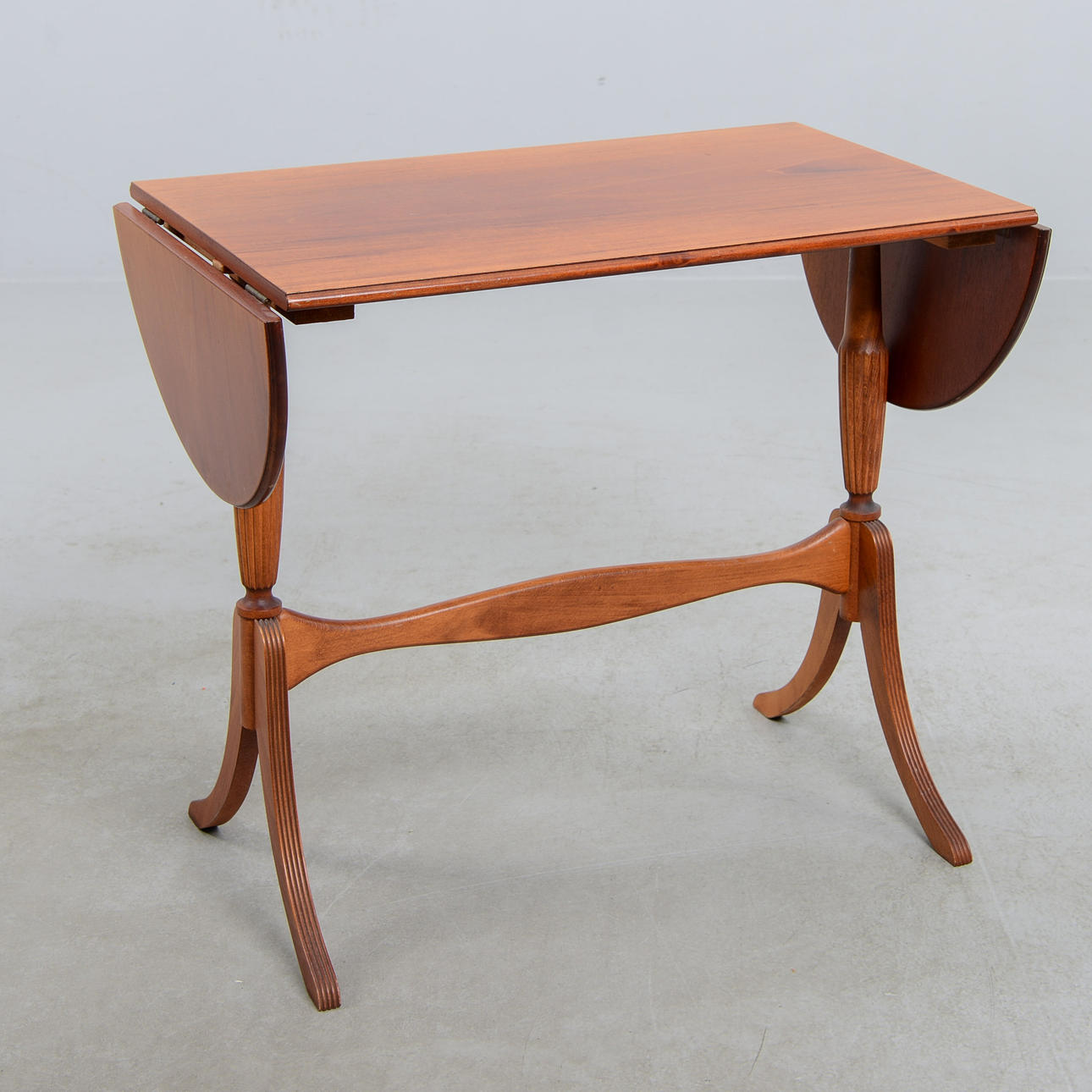 An Empire style folding table, 20th century.