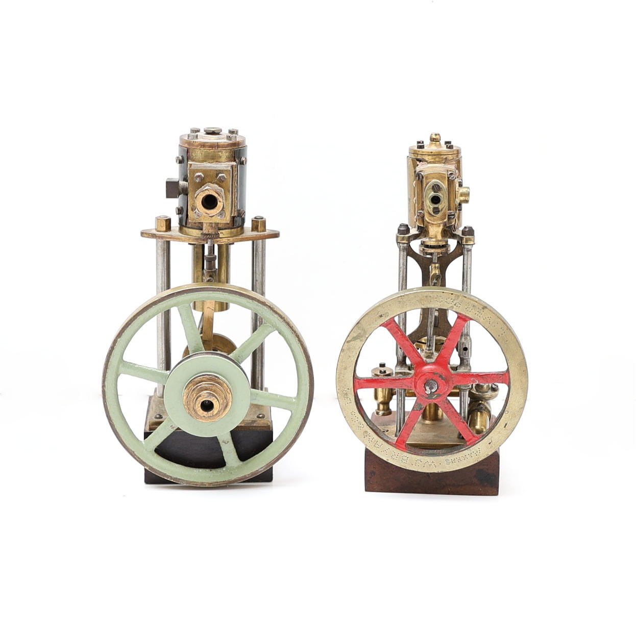 TWO STATIONARY SCALE MODEL VERTICAL LIVE STEAM ENGINES.