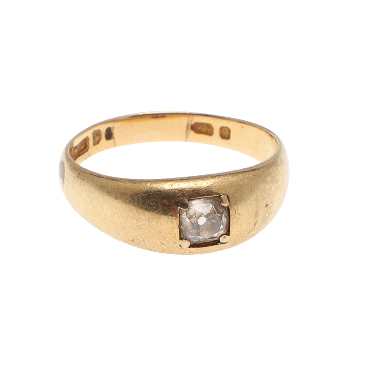 A DIAMOND AND GOLD GYPSY RING.