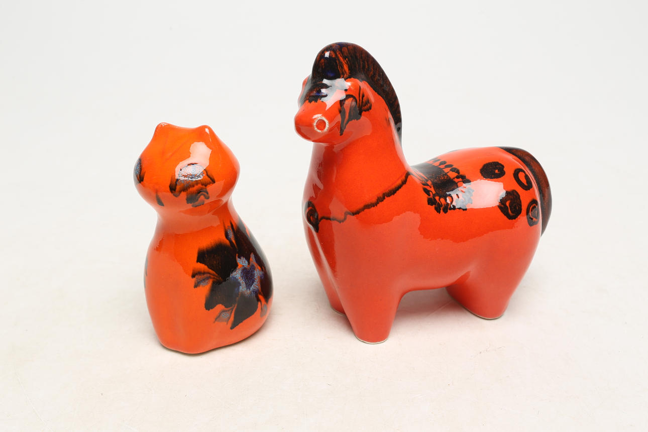 A set of 2 ceramic animals, orange.