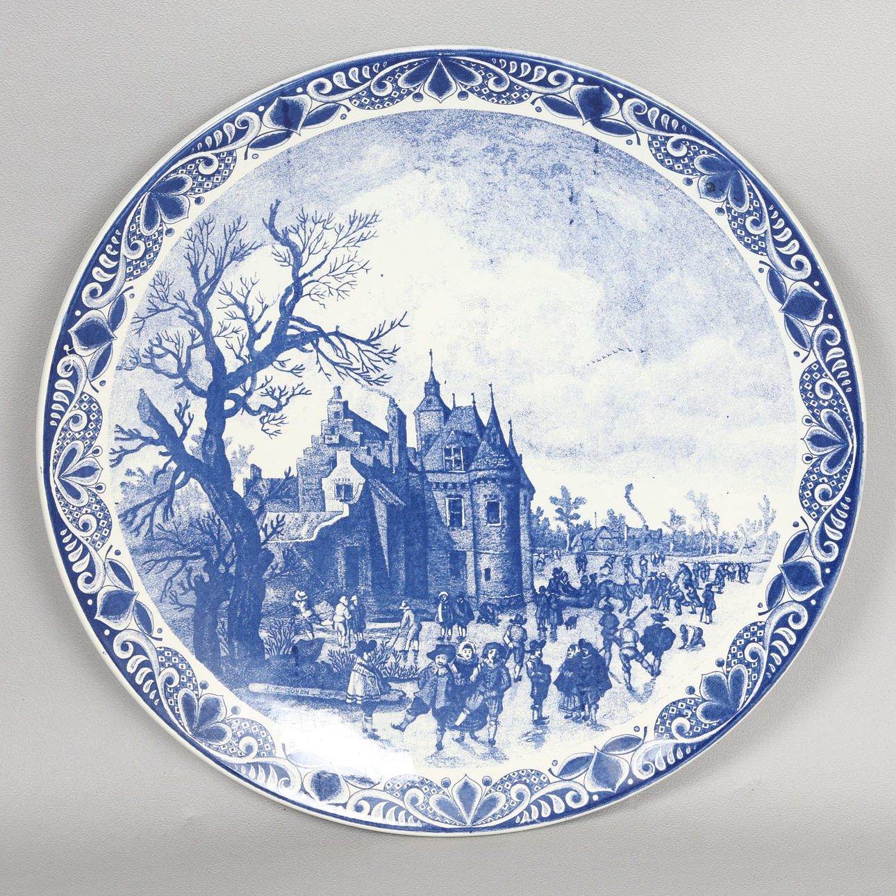 EN HOLLANDSK DELFT BLÅ OG HVID OPLADER.