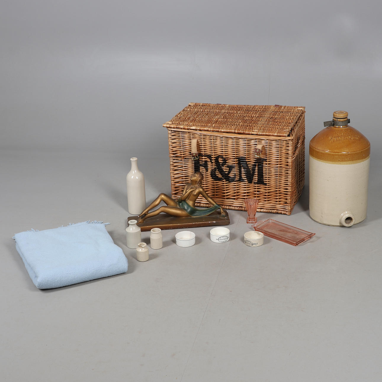 A FORTNUM & MASON WICKER HAMPER AND CONTENTS.