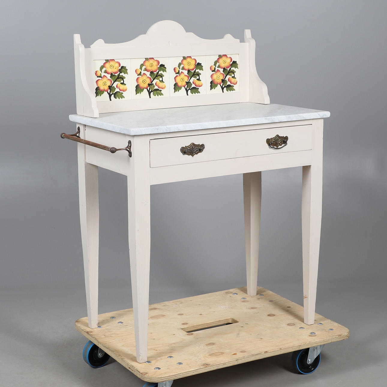 A MARBLE TOPPED WASHSTAND.