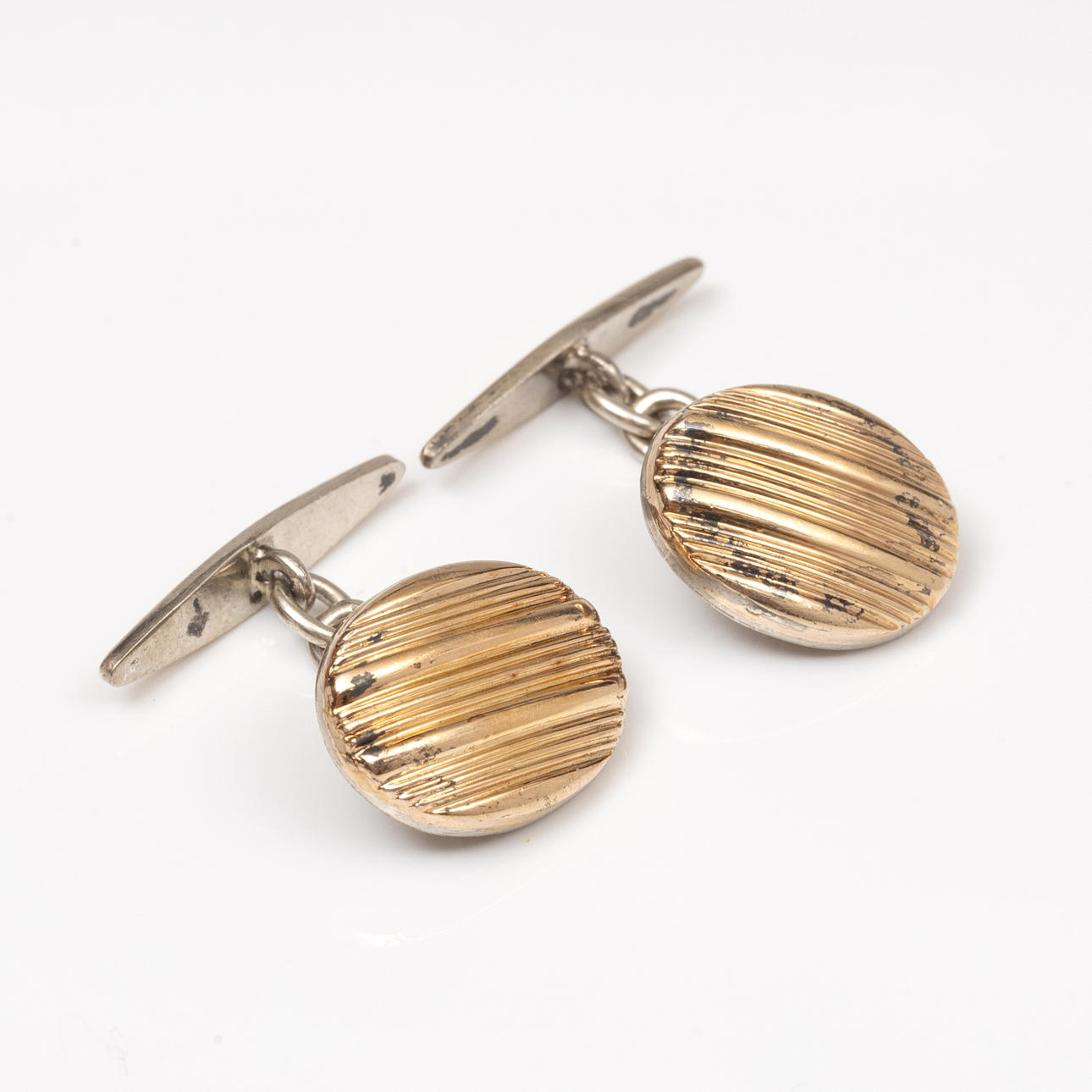 CUFFLINKS, Gold plated silver.