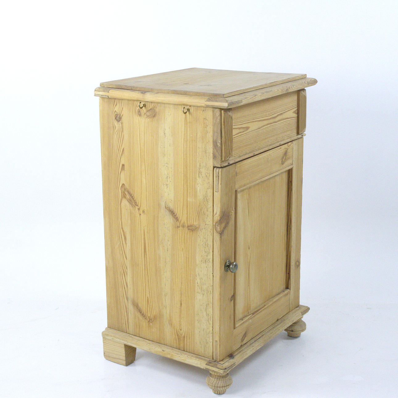 A pot cabinet, tilted pine, 20th century.