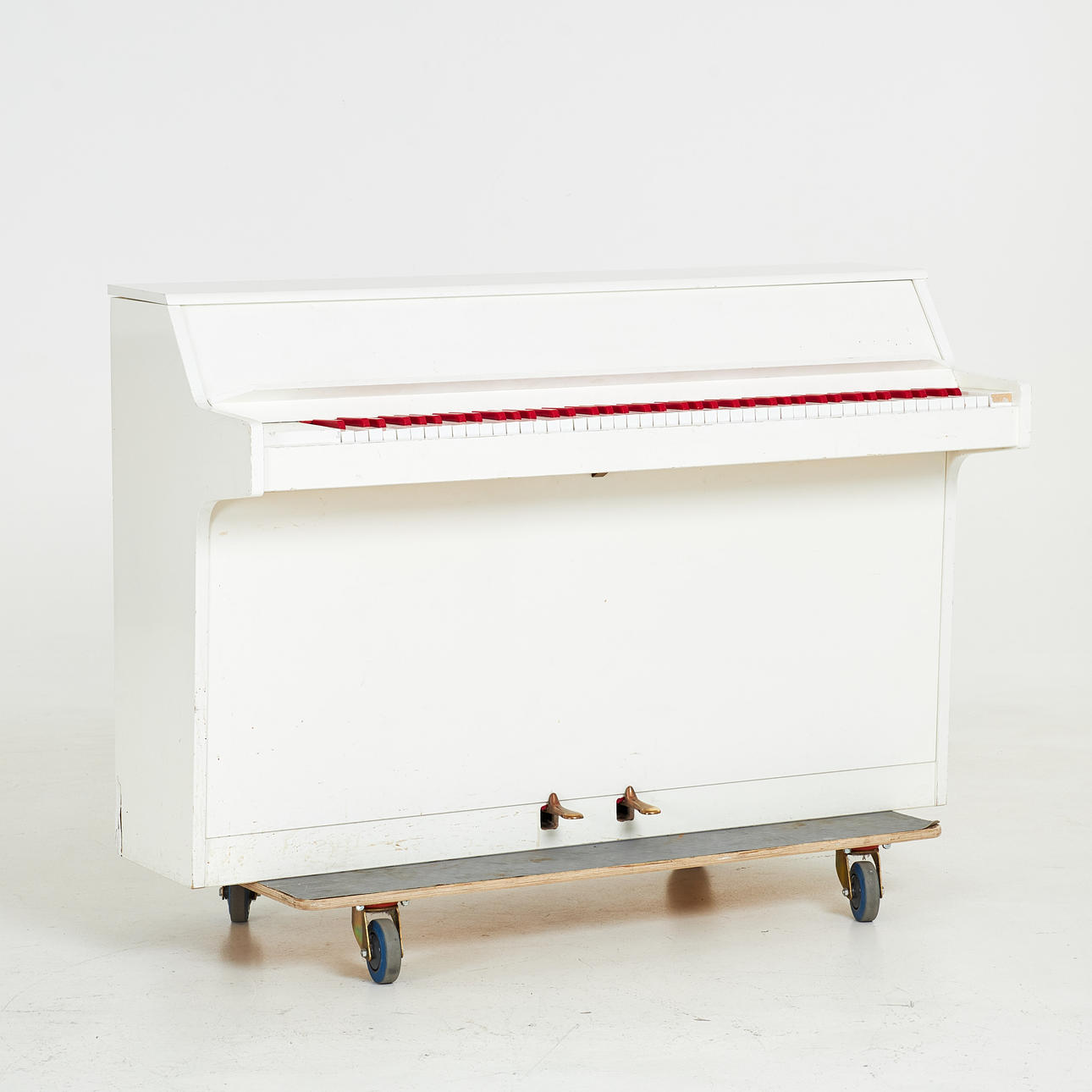 PIANO, white and red keys, circa 1970s.