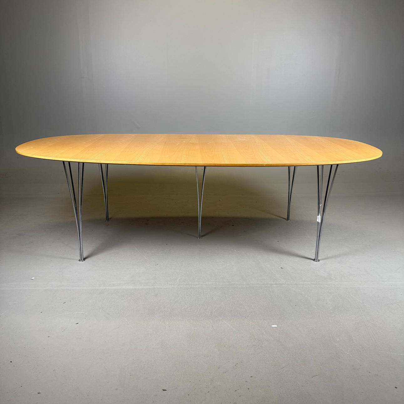 BRUNO MATHSSON & PIET HEIN. A dining table, “Superelips”, Fritz Hansen, Denmark 1984.
