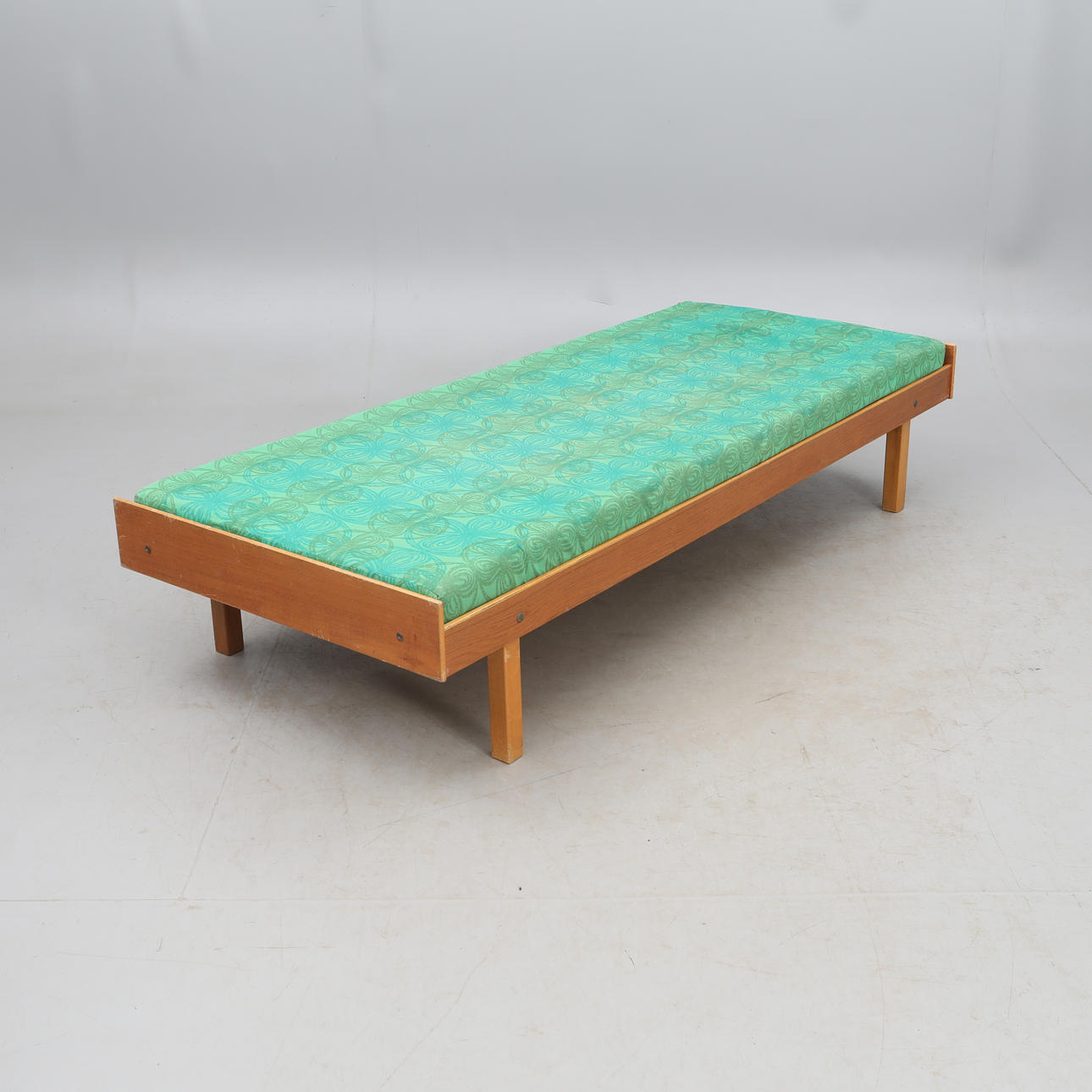 A 1960s-style teak daybed.