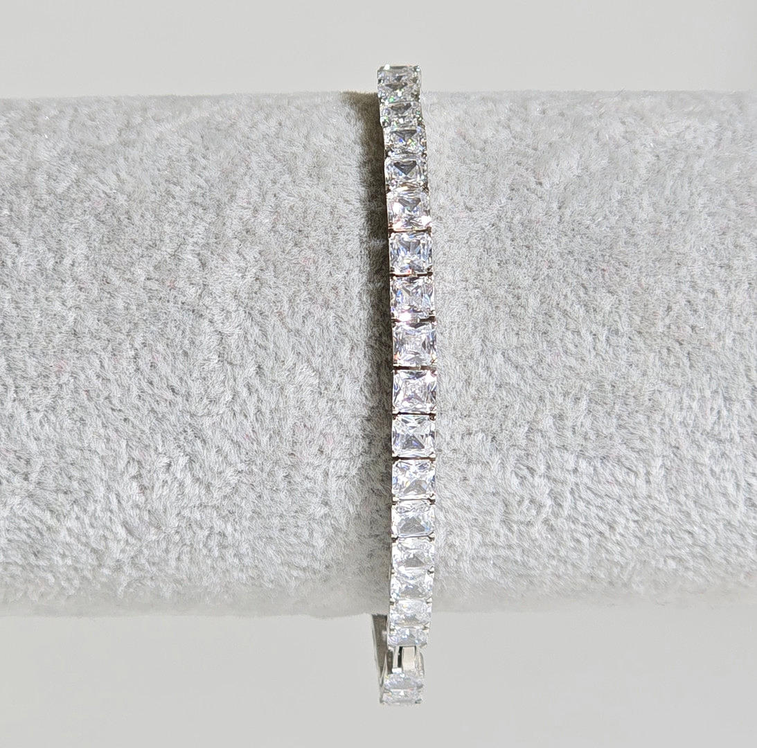 PULSERA RIVIERE EN PLATA Y CIRCONITAS.