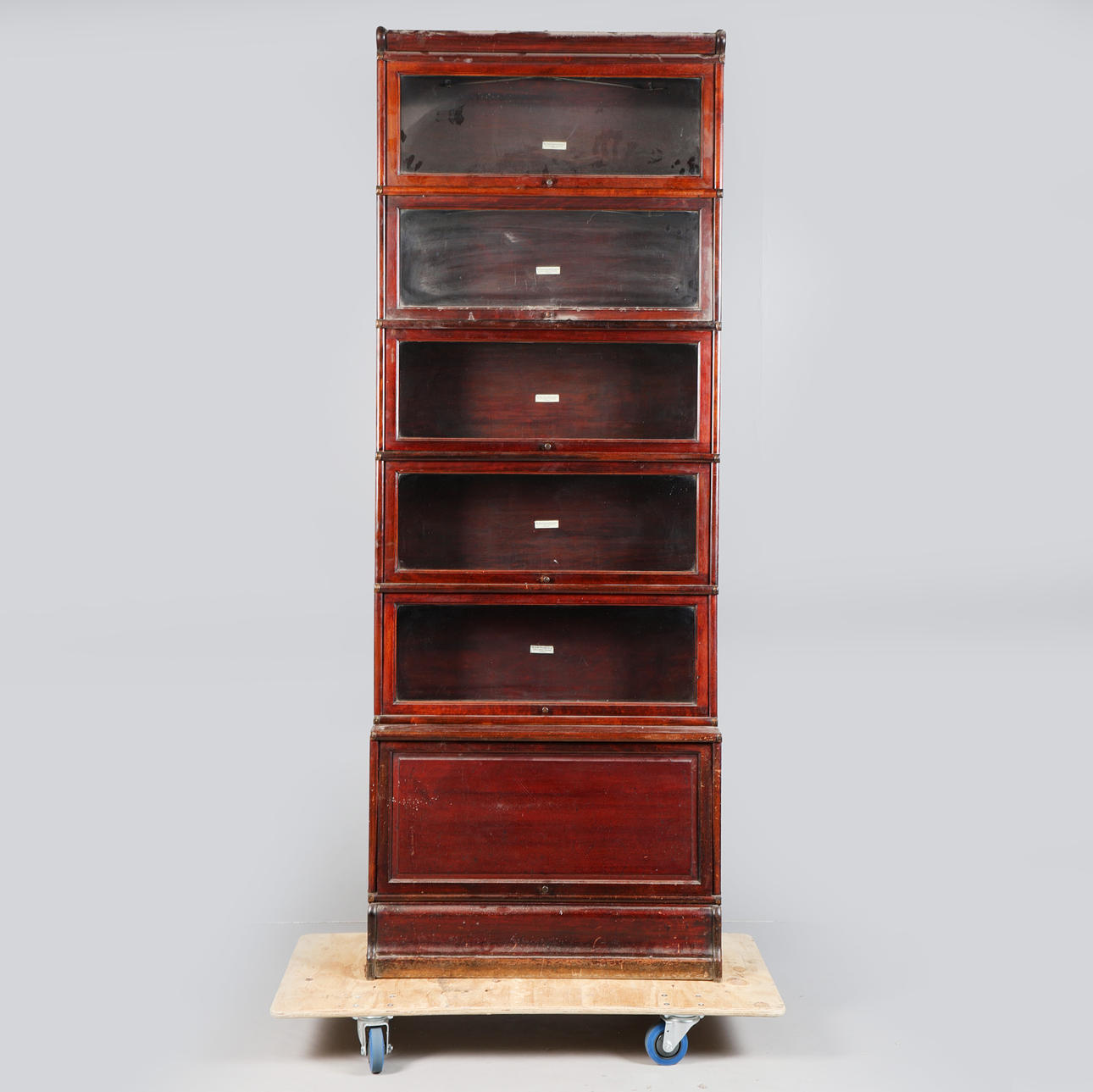 A GLOBE-WERNICKE AND CO. MAHOGANY BOOKCASE.
