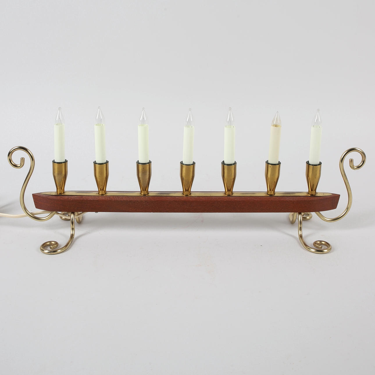 A teak/brass candlestick, 'Viking', 20th century.