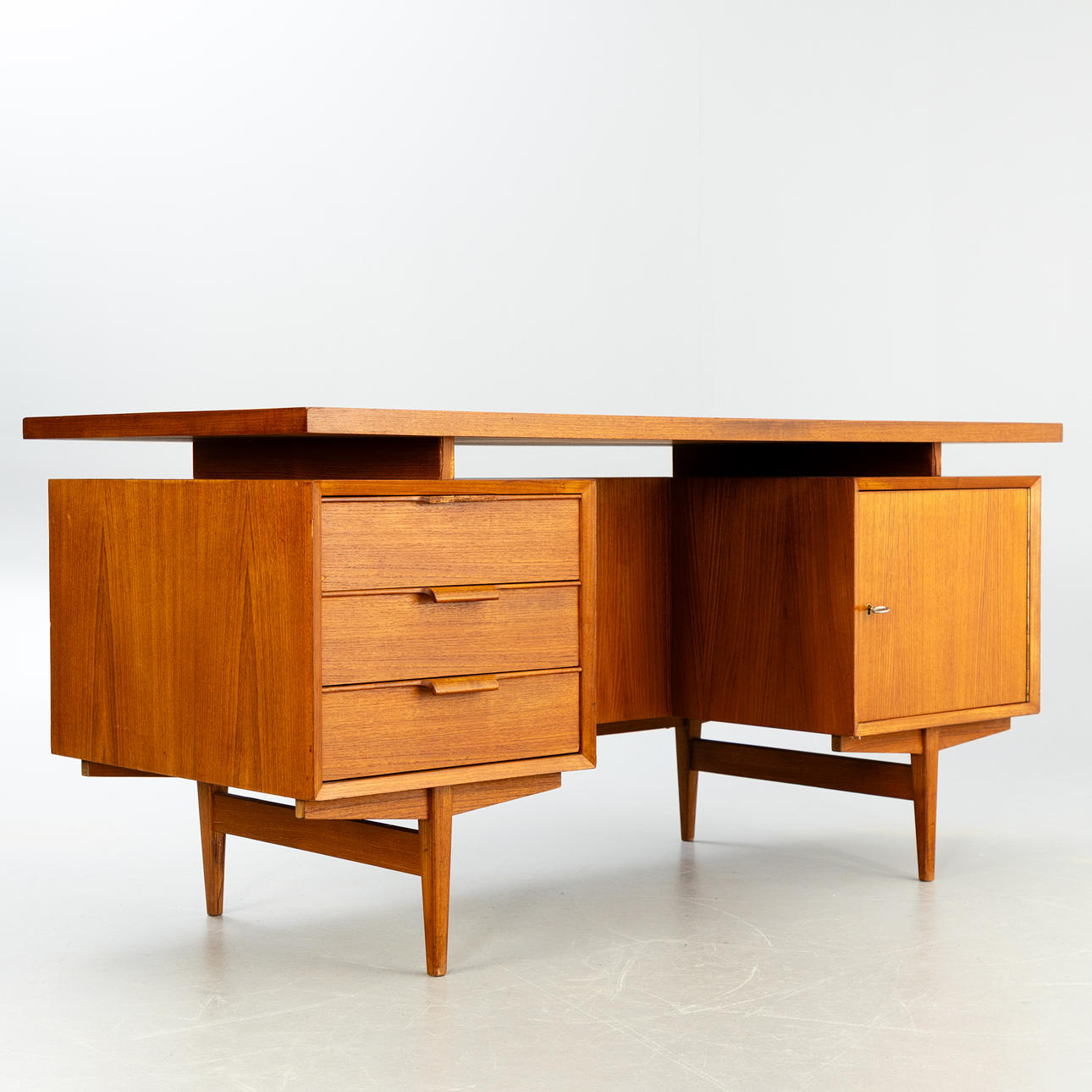 Free-standing teak desk, 1960s.
