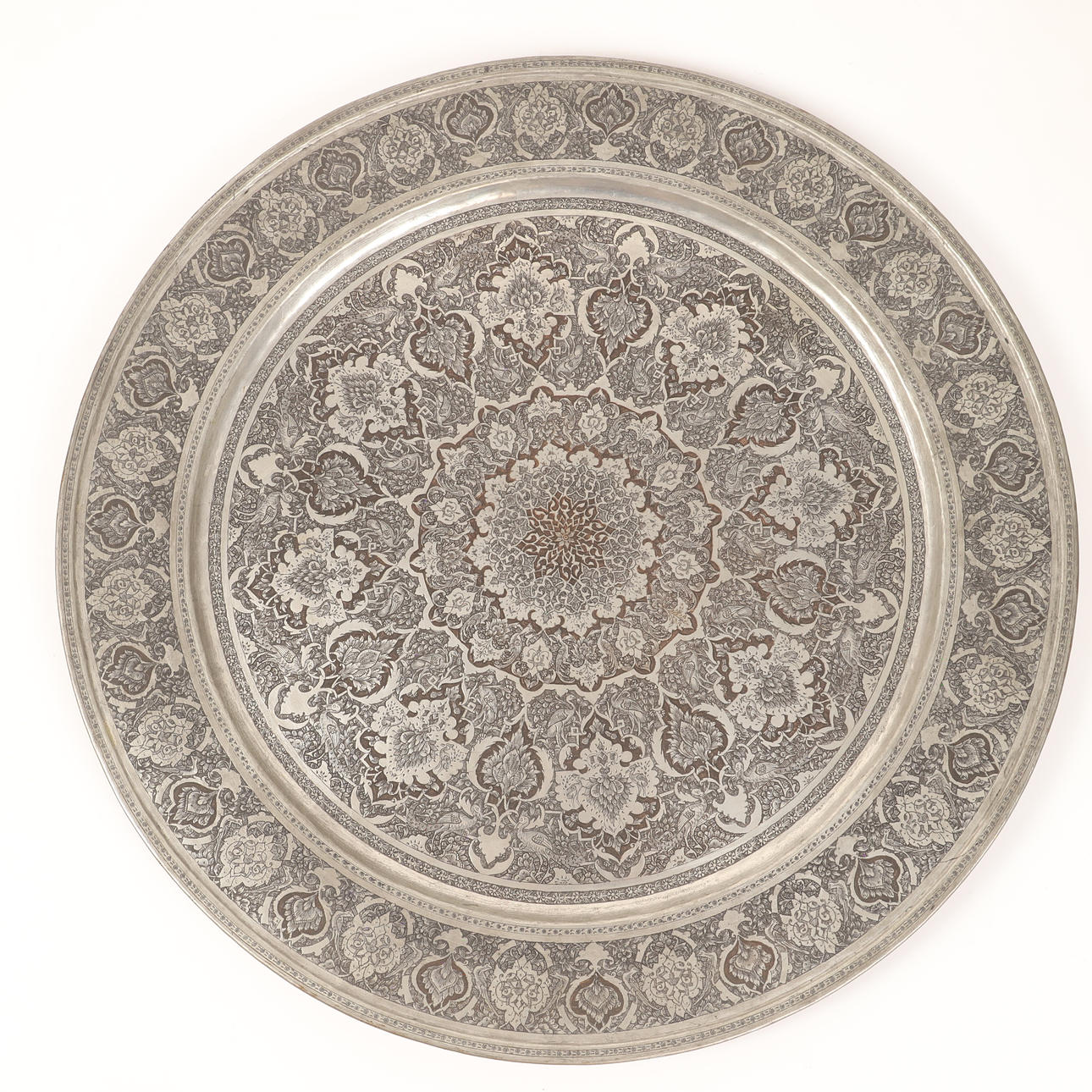 TRICK/, metal with oriental pattern.