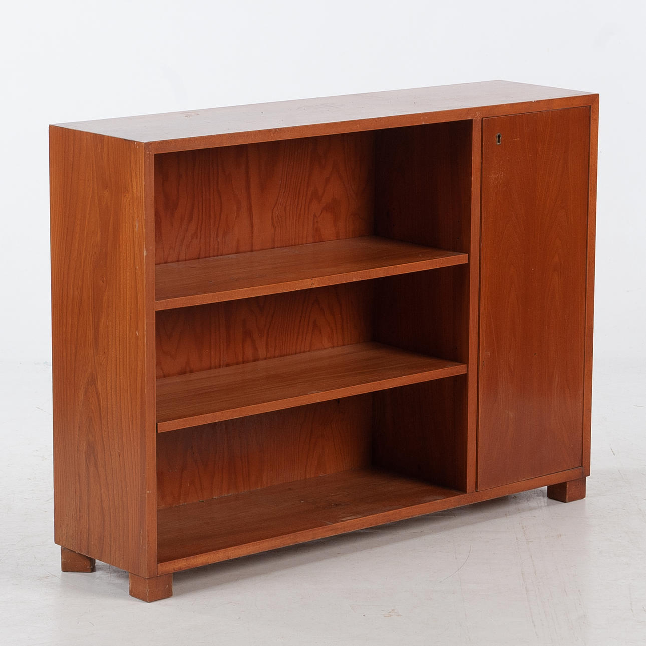 Bookcase with door, mid 20th century.