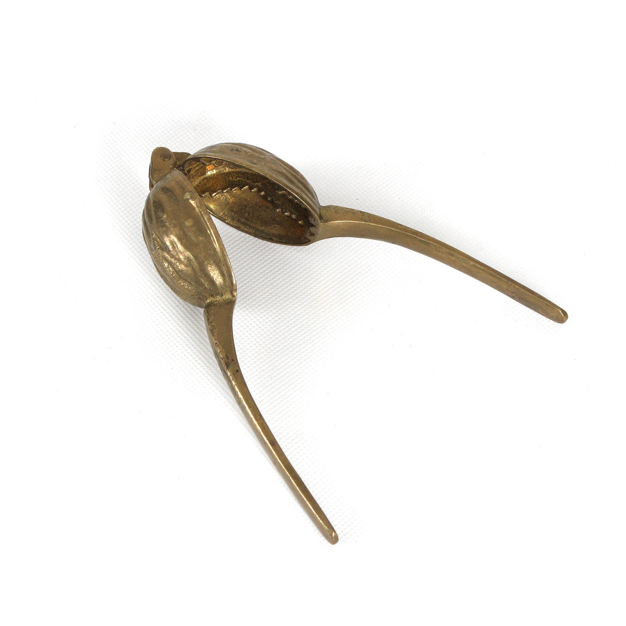 A brass nutcracker, 20th century.