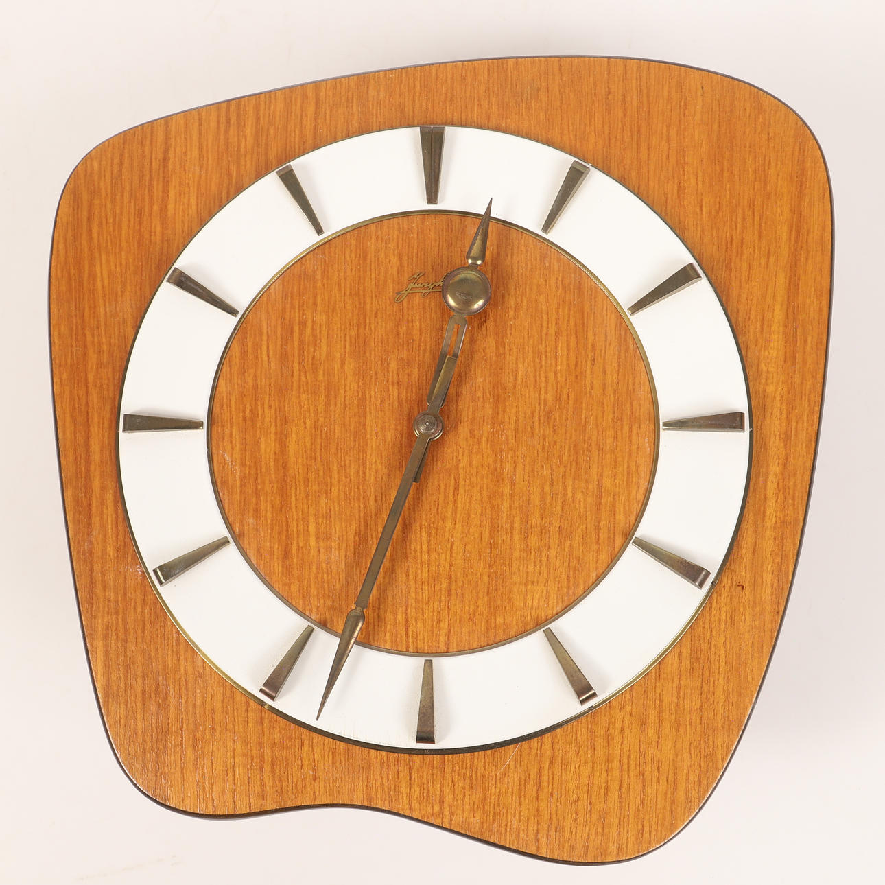 A 1960 Junghans teak wall clock.