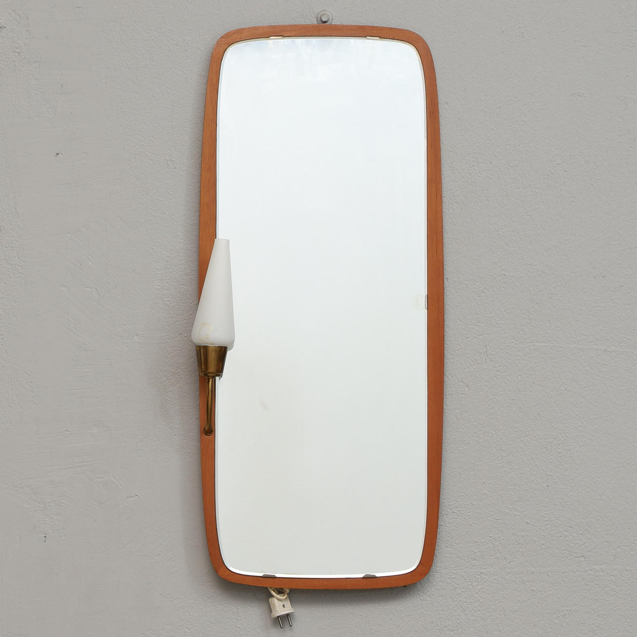 A 1950's Eriksmålaglas lighting teak mirror.