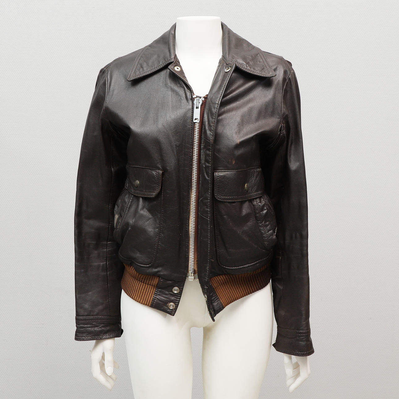 LEATHER JACKET. dark brown, Petroff, 20th century.
