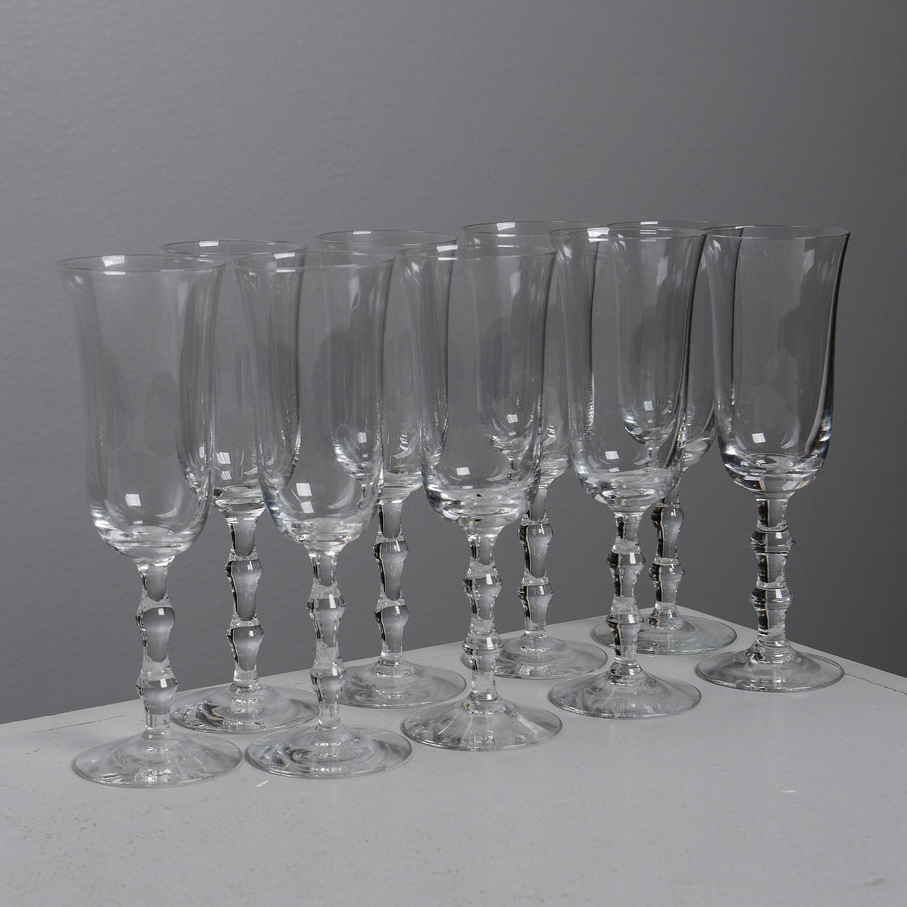 SIMON GATE. „Salut“, Sektgläser, 9 Stück, Orrefors.