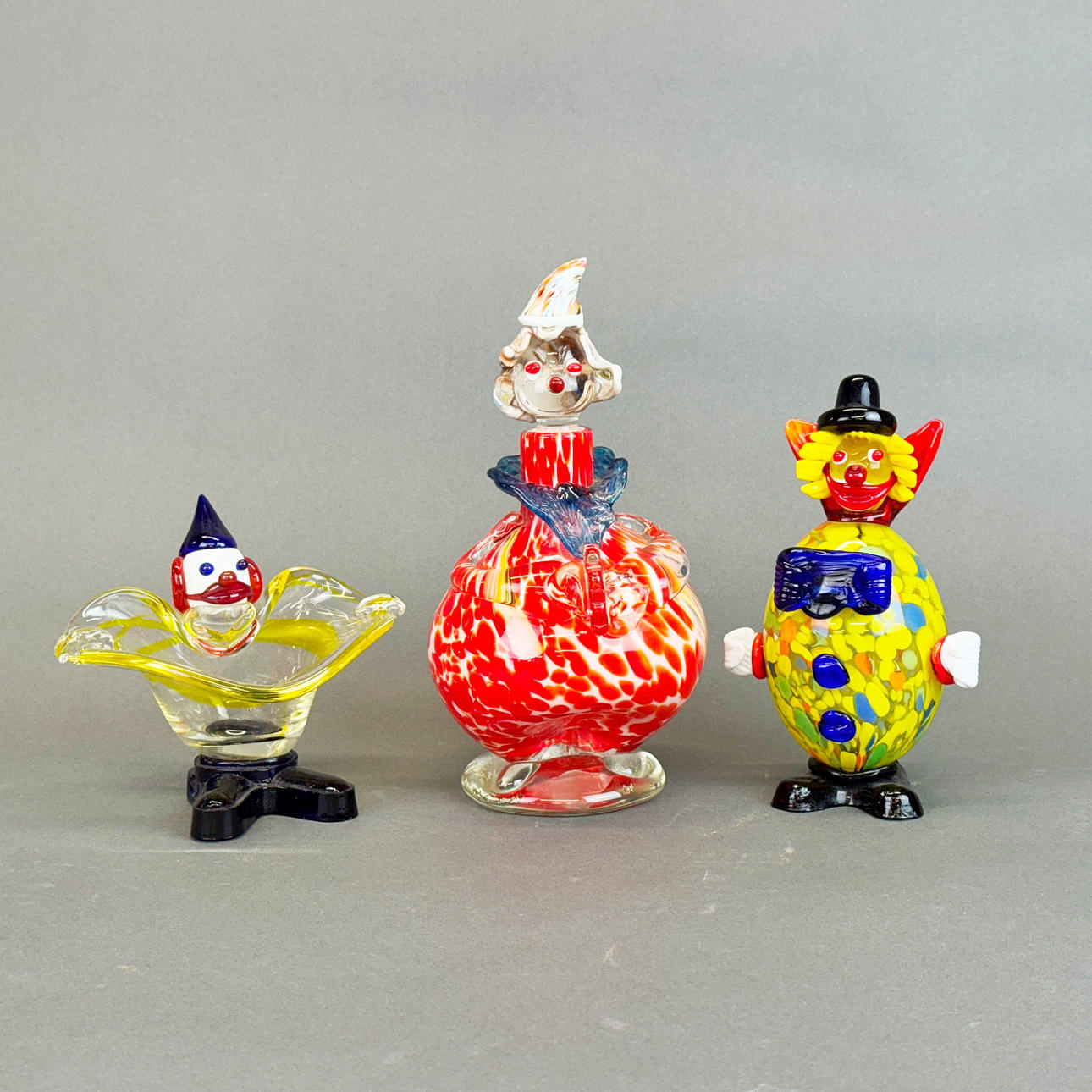 THREE MURANO STYLE GLASS CLOWNS.