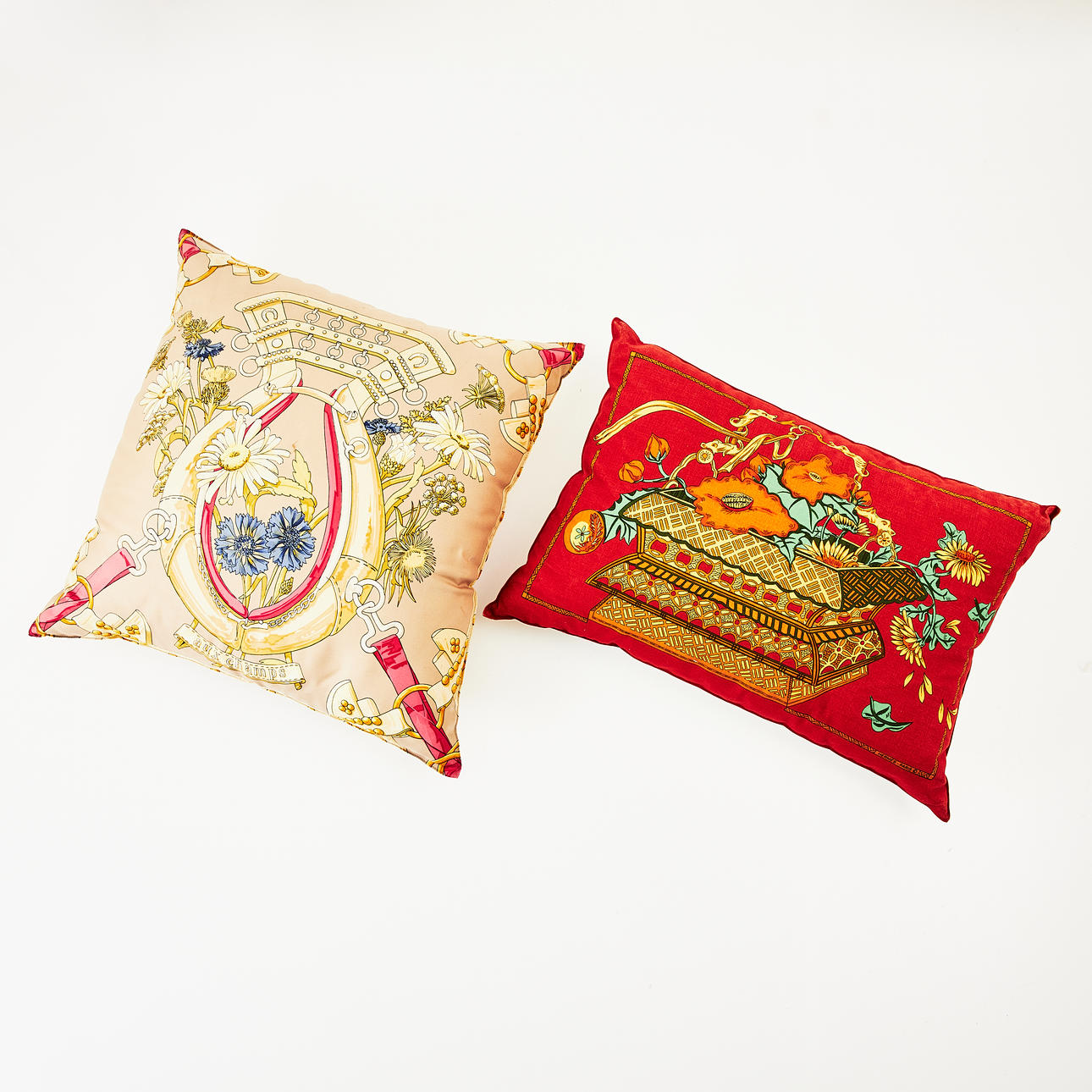 PILLOWS, 2 pcs., made of textiles from Hermès.