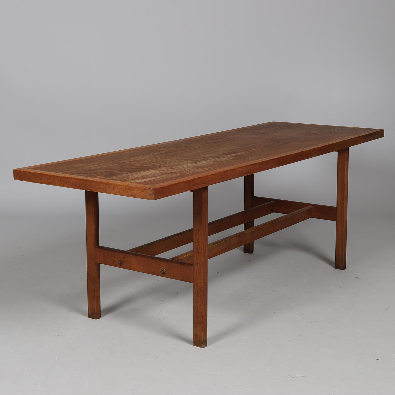 Jørgen Bækmark for FDB. Rectangular oak coffee table, brass fittings, Denmark, designed in 1961.