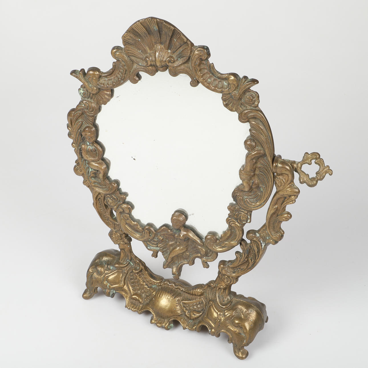 A metal table mirror, 20th century.