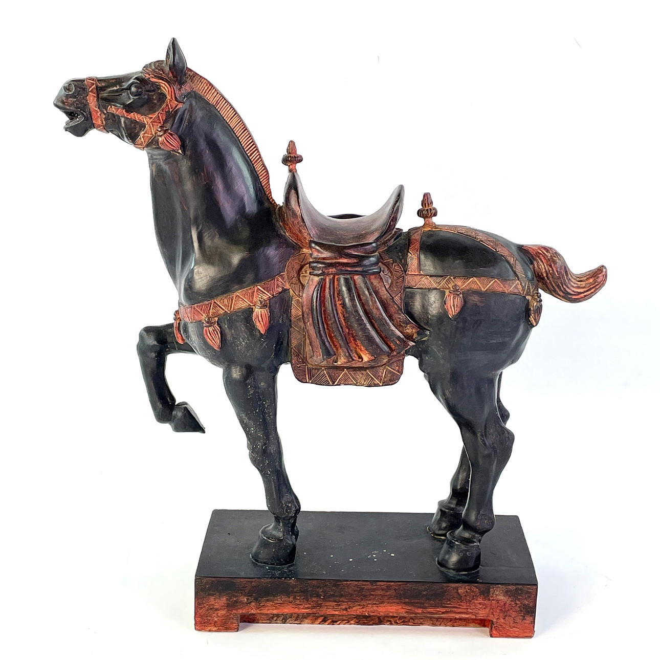 A figurine, art material, horse.