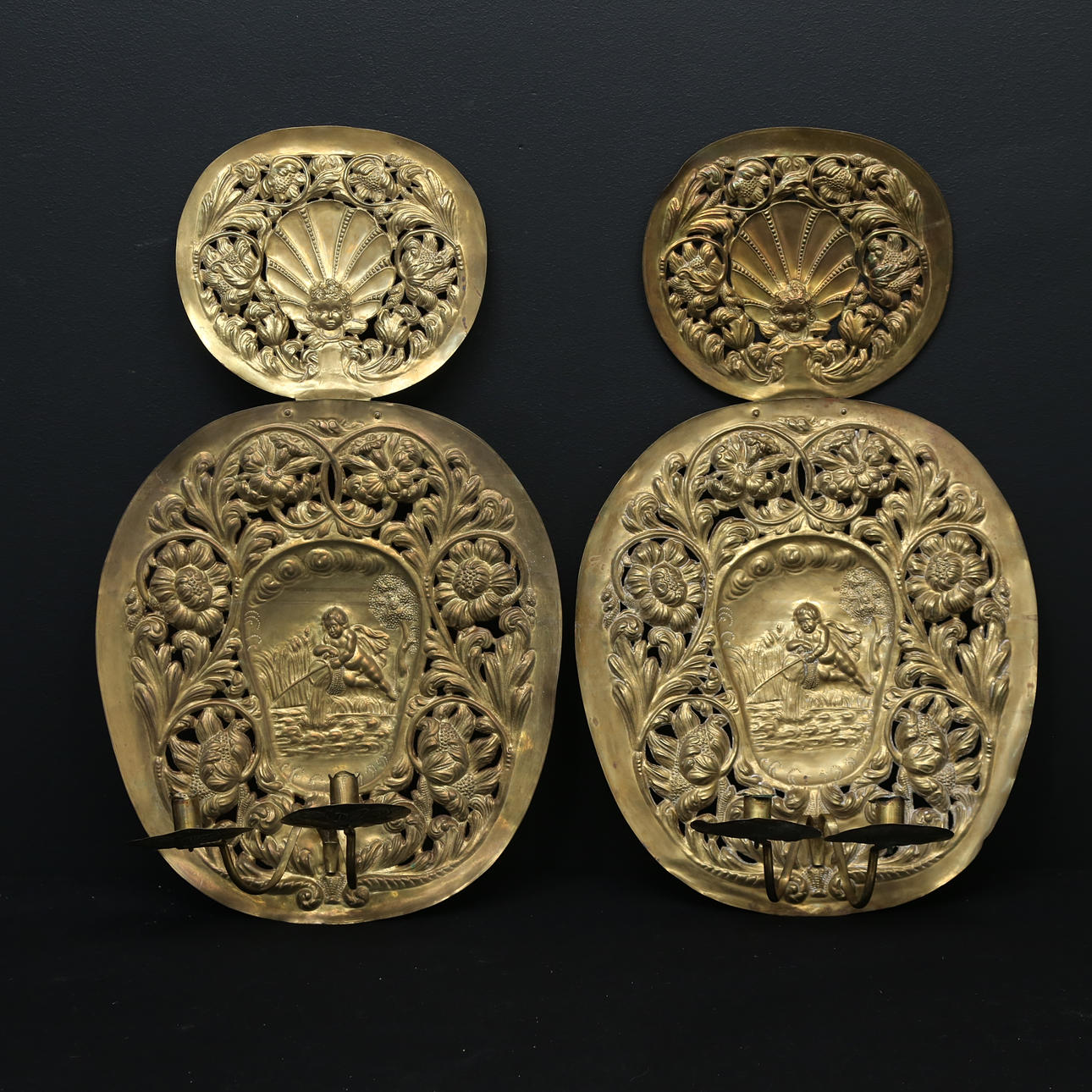 JOHN F. HELLSTROM. A pair of baroque light plates, Nyköping, 1896.