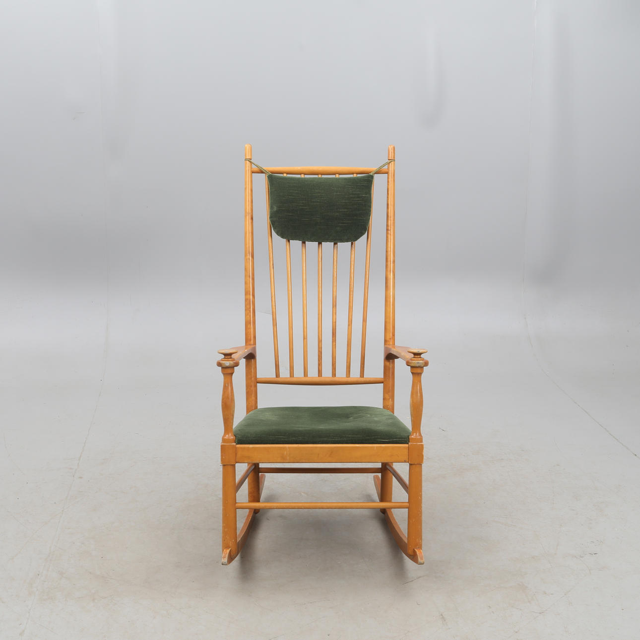 A mid 20th century rocking chair.