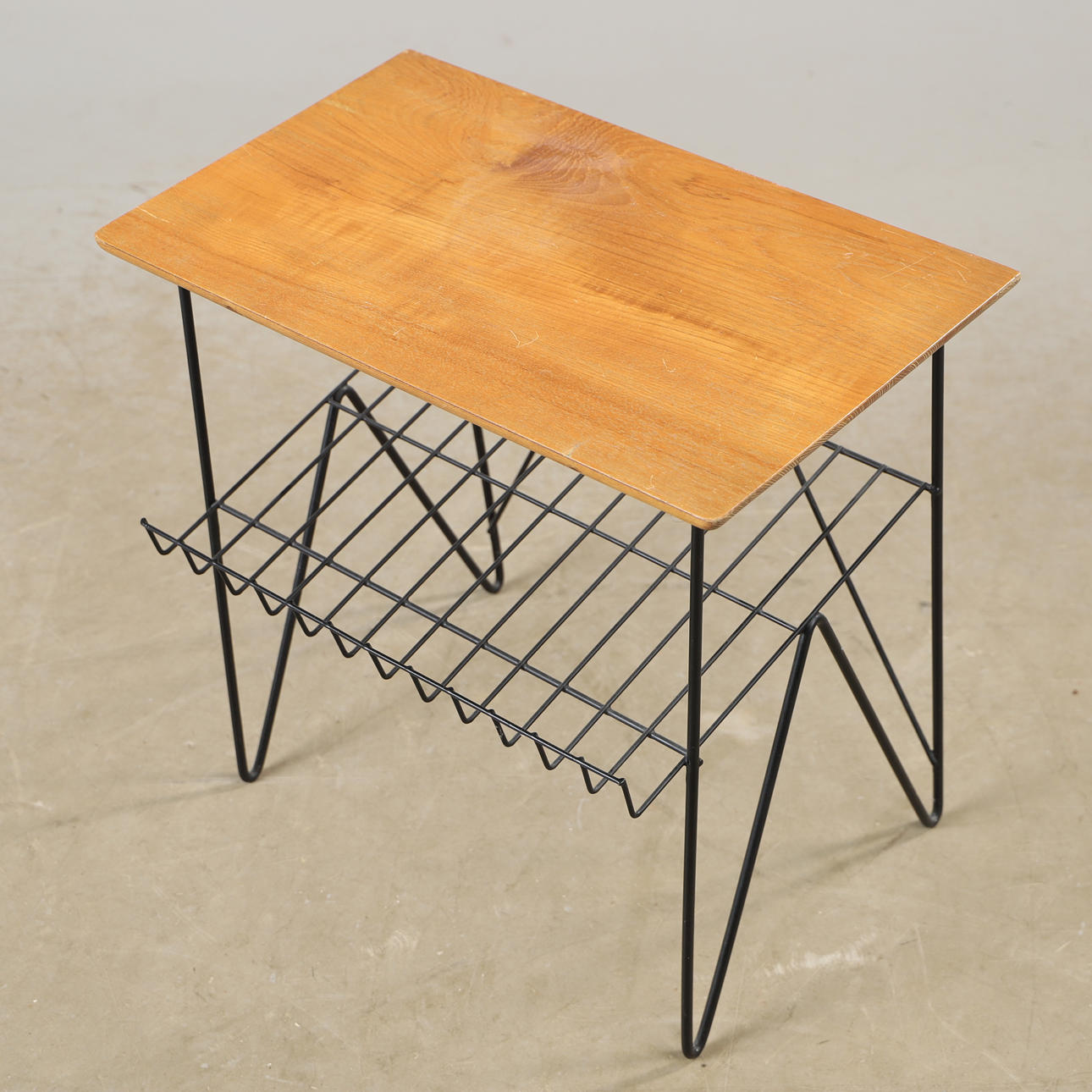 TABLE WITH MAGAZINE SHELF, teak, mid 20th century.