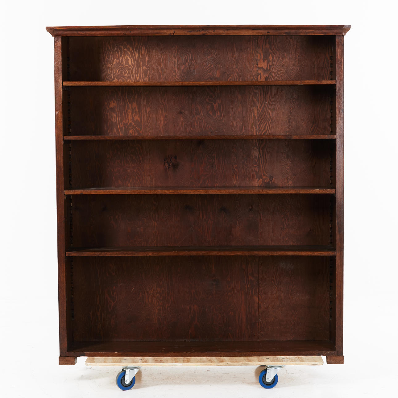 A bookcase, oak, circa 1900, four shelves.