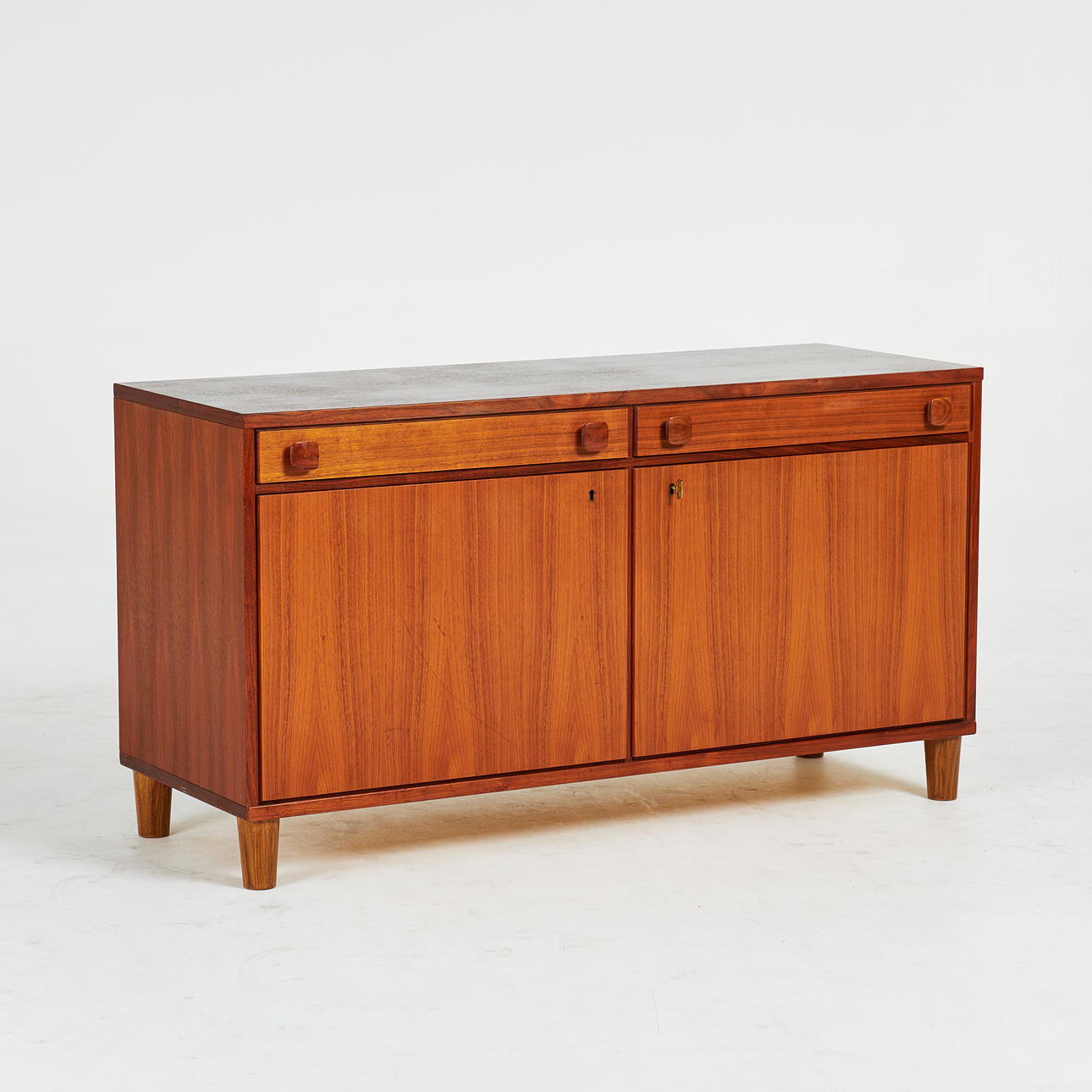 A SIDEBOARD, Ulferts, mid 20th century, veneered with teak.