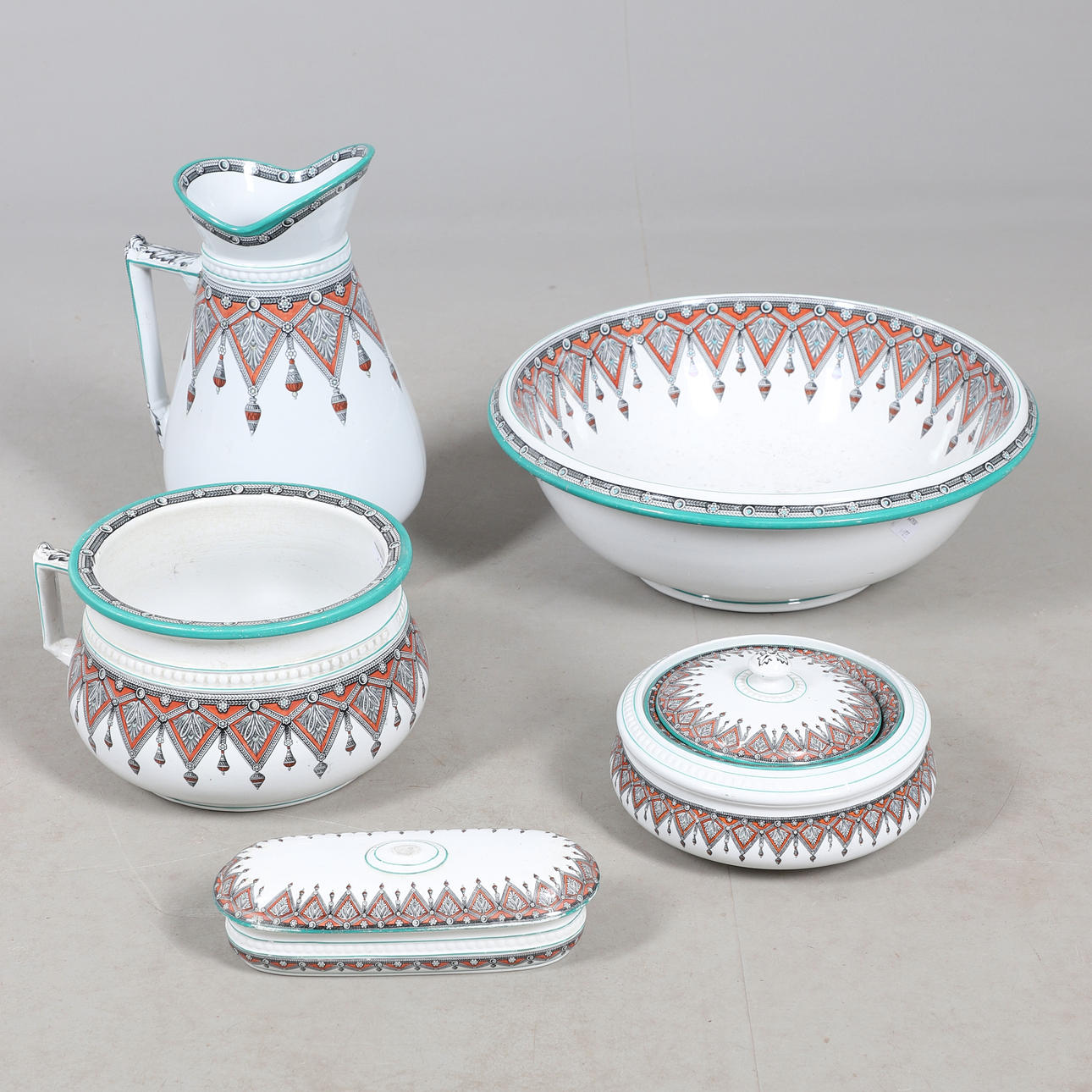 A VICTORIAN FIVE PIECE TOILET SET.