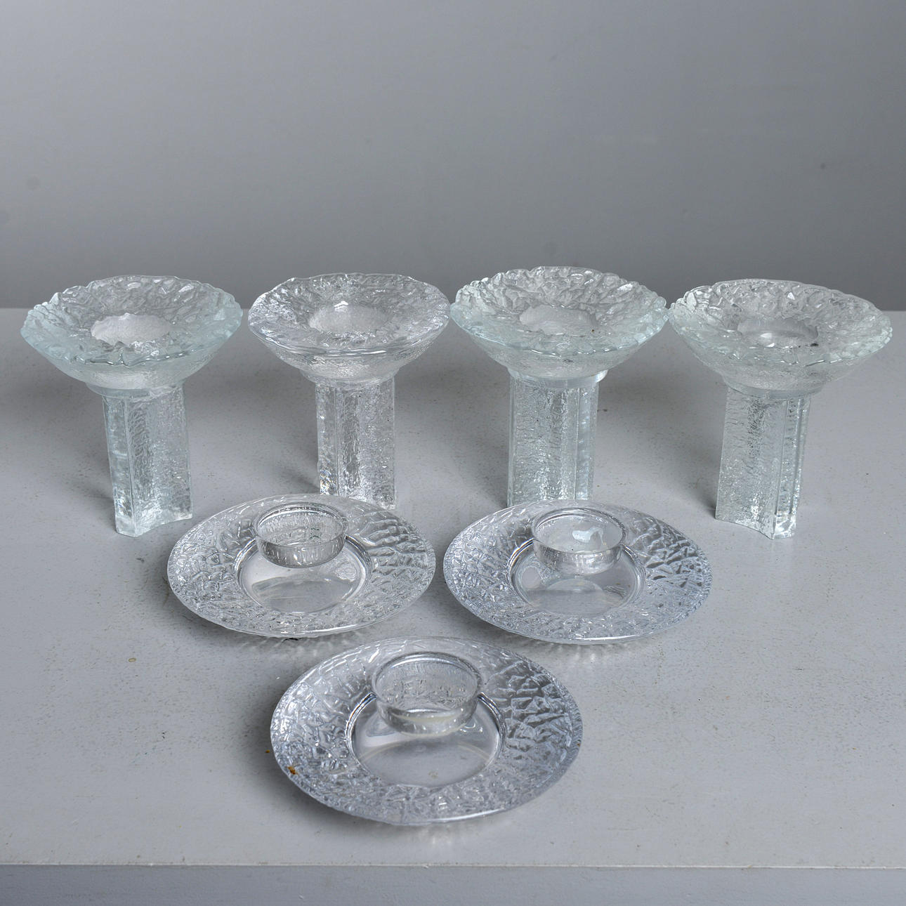 LARS HELLSTEN. 7 candle lanterns, Discus and Olympic Fire, Orrefors.