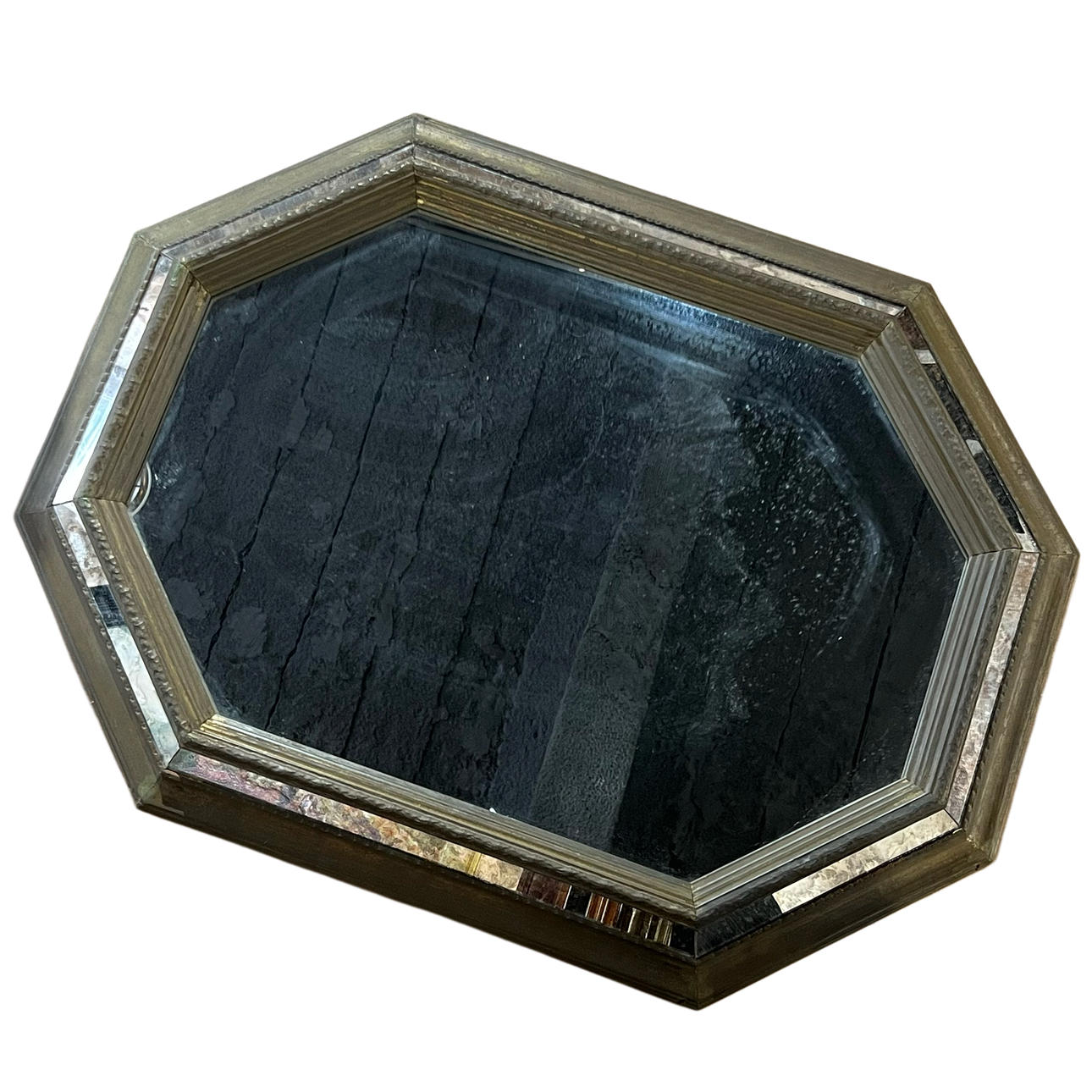 Mirrored octagonal mirror in wood and brass.