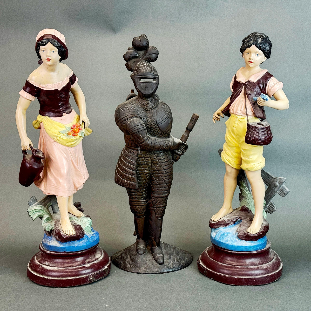 THREE METAL FIGURES.
