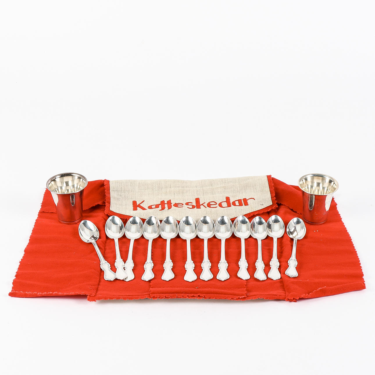 COFFEE SPOONS AND BEAKER silver.