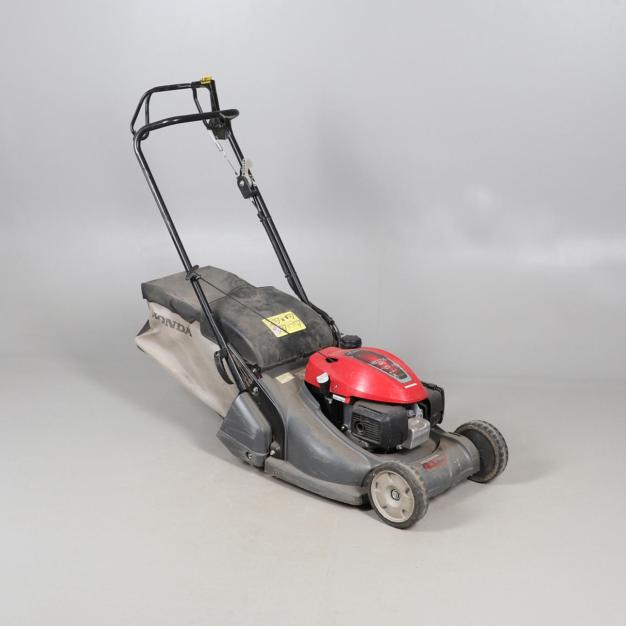 A HONDA PETROL LAWNMOWER.