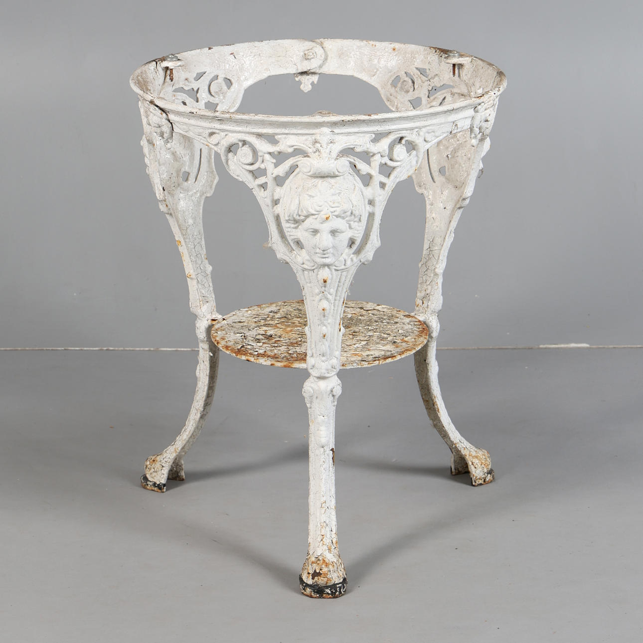 A VICTORIAN CAST IRON TABLE BASE.