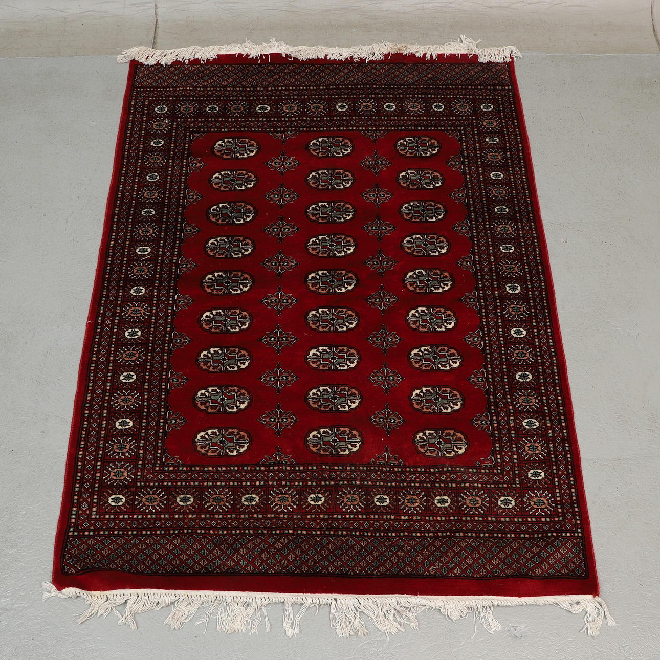 A CARPET, oriental, hand-knotted, dimensions approx: 203x146 cm.