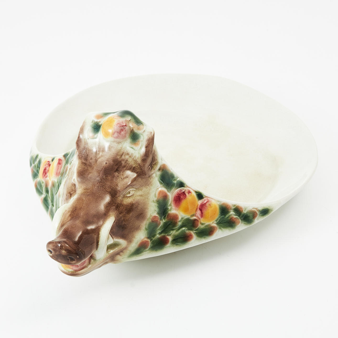 A flintware platter, boar's head decor with polychrome glaze, Rörstrand, early 20th century.