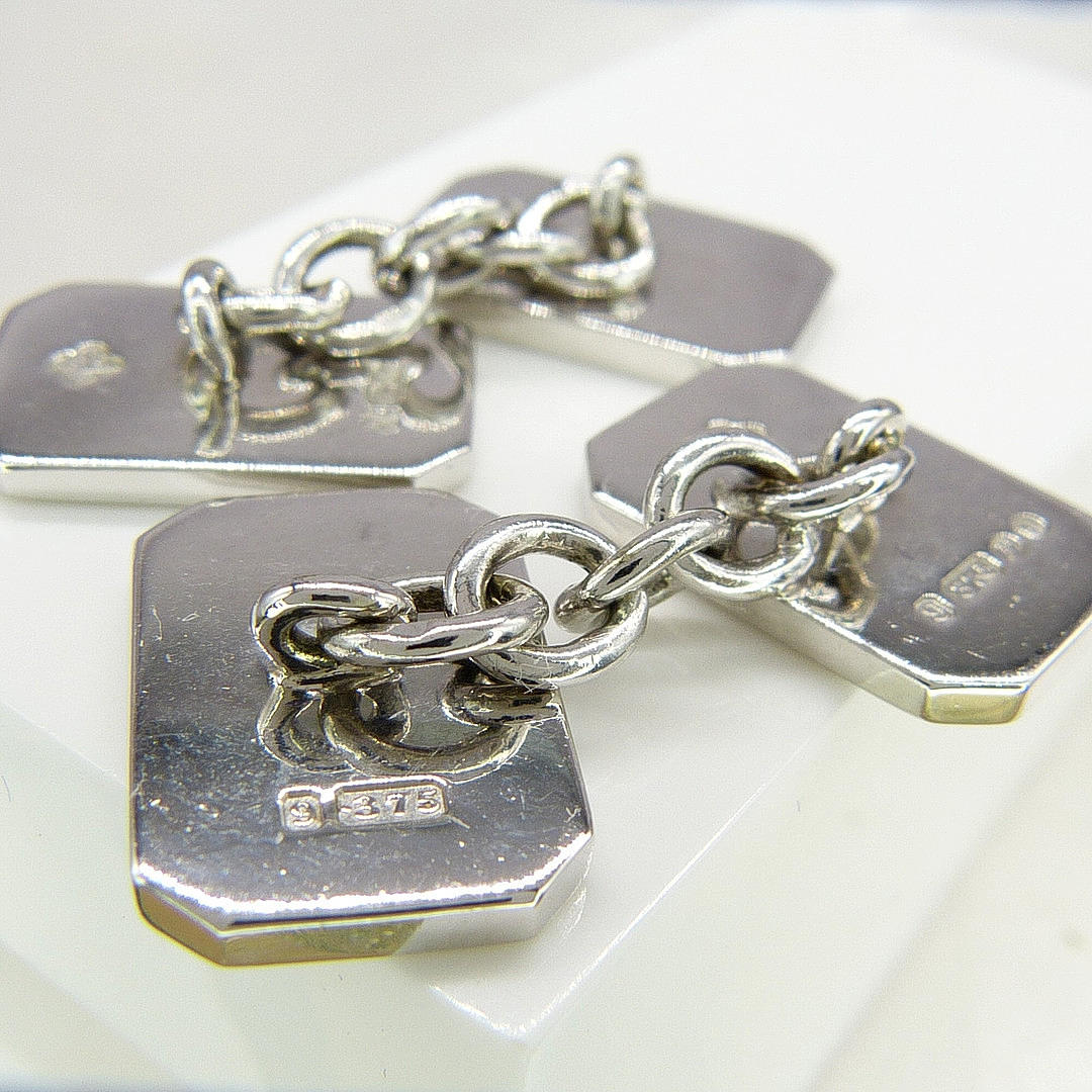 SOLID WHITE GOLD CUFFLINKS.